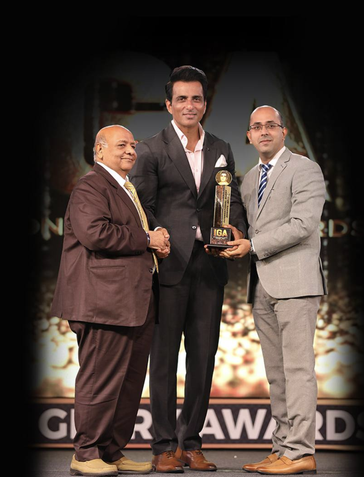 Sandeeip Boggra receiving an award